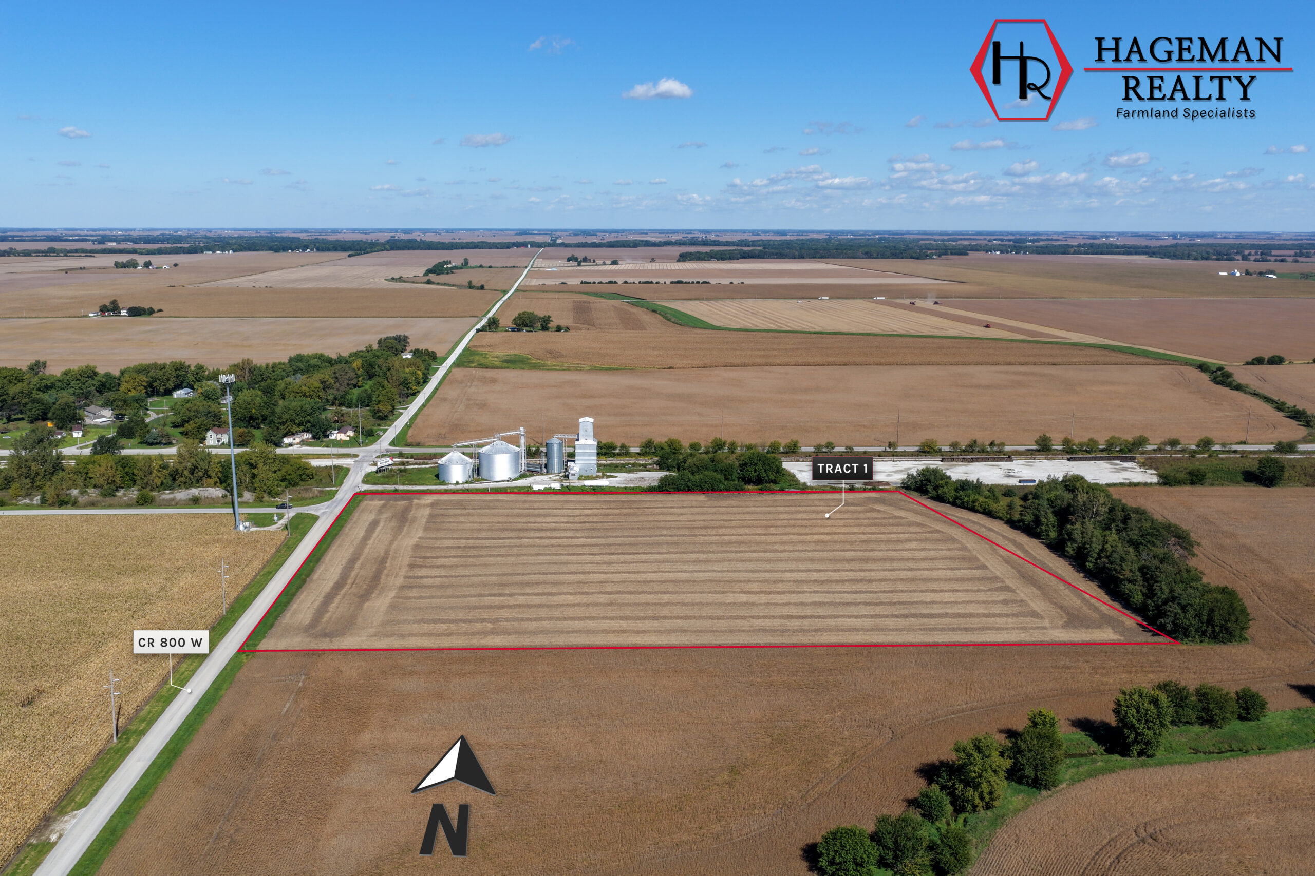 Portteus Farm Tract 1 outlined in red beside CR 800 W, with grain bins and an elevator across the road